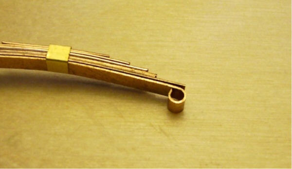 eingerolltes_Federende