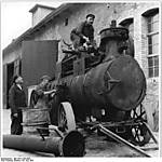 3560601px-Bundesarchiv_Bild_183-11025-0005_Langenbogen_Reparatur_eines_Lokomobils.jpg
